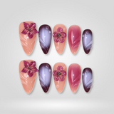 Luxe Bloom almond nails with sparkly crystal accents