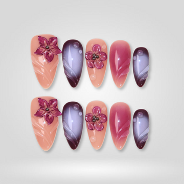 Luxe Bloom almond nails with sparkly crystal accents
