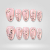 Pink Alloy almond press-on nails with 3D silver design