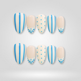 Blue Stripe press-on nails with white French tips and polka dots