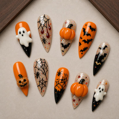 Midnight Harvest Halloween press-on nail set displayed in a walnut tray — stiletto shape