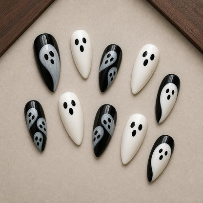 Mod Ghost Halloween press-on nail set displayed in a walnut tray — almond shape