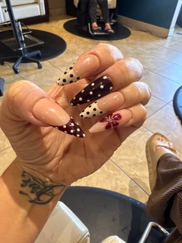 Customer photo of Berry Dots press-on nails shared in a review