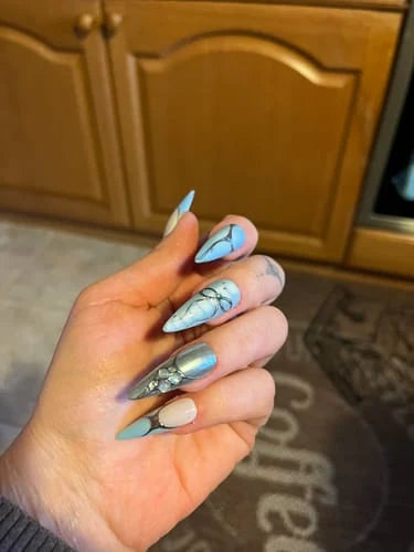 Customer photo of Silver Glaze press-on nails shared in a review