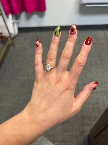 Customer photo of Bug Charm press-on nails shared in a review