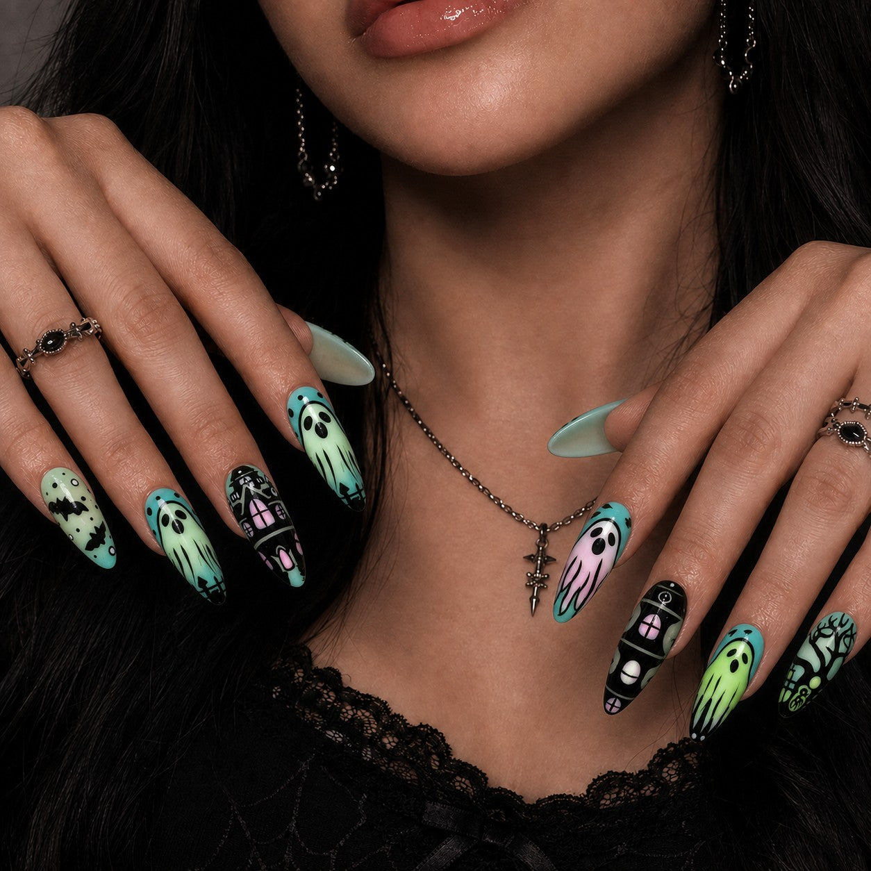 Pastel Manor Halloween press-on nails in almond shape worn on model hand — haunted house, ghost, pastel nail art