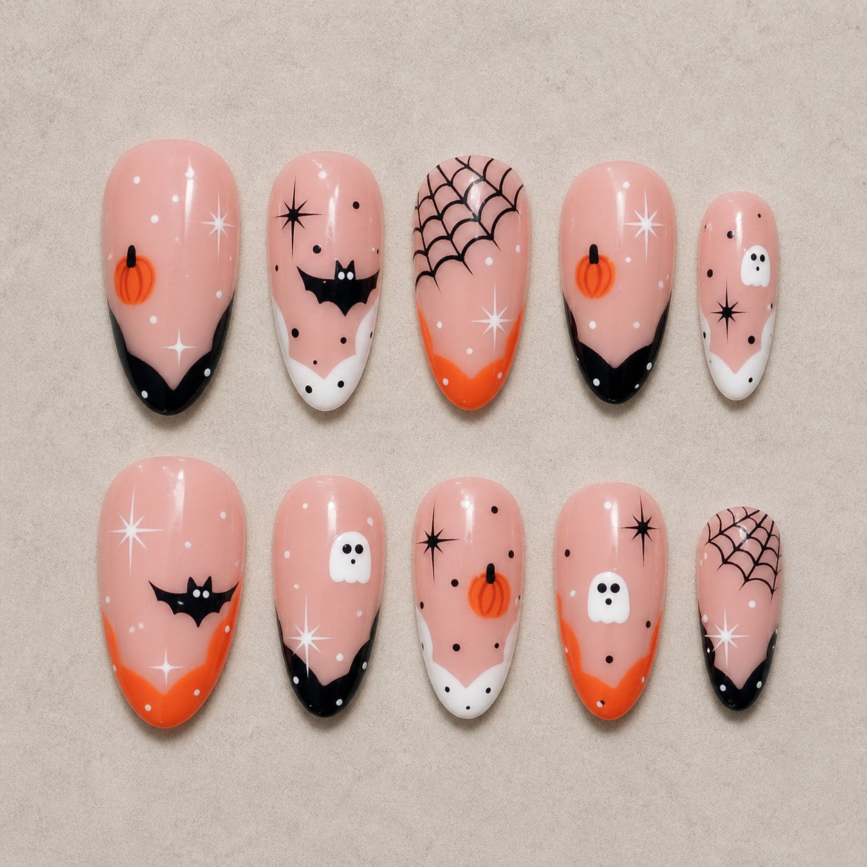 Full set of 10 almond press-on nails — Peachy Phantom Halloween nail art with french tip, peach, ghost