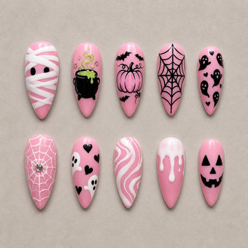Pink Potion press-on nails with witch cauldron and mummy design on almond shape