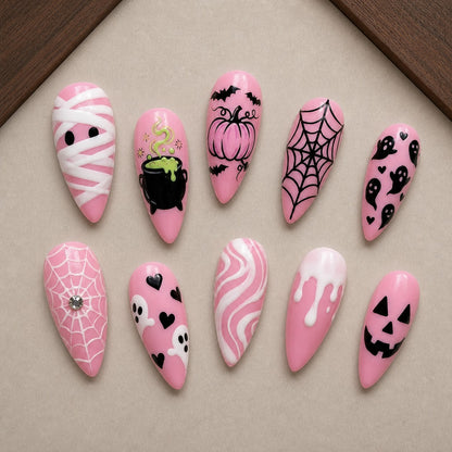 Pink Potion Halloween press-on nail set displayed in a walnut tray — almond shape