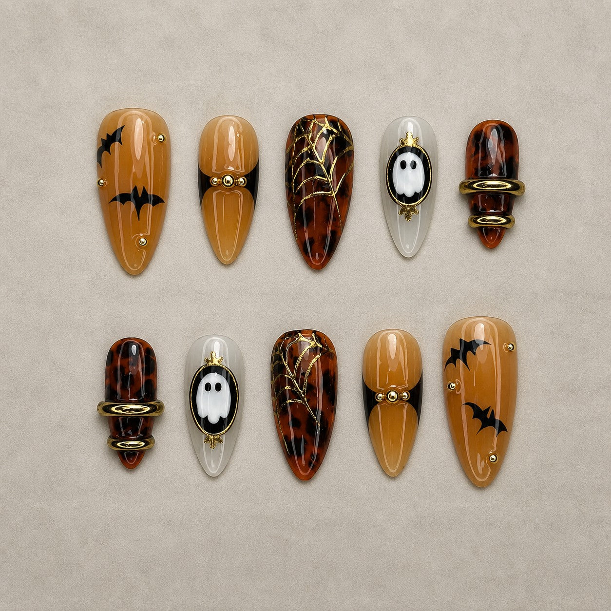 Full set of 10 almond press-on nails — Tortoise Twilight Halloween nail art with tortoiseshell, bat, gold