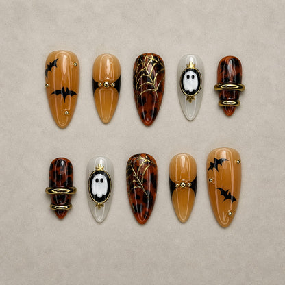 Full set of 10 almond press-on nails — Tortoise Twilight Halloween nail art with tortoiseshell, bat, gold