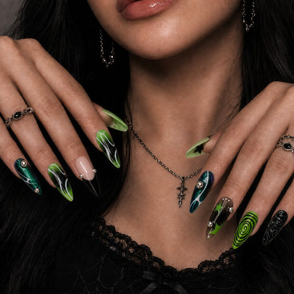 Toxic Swirl Halloween press-on nails in almond shape worn on model hand — neon, y2k, green nail art