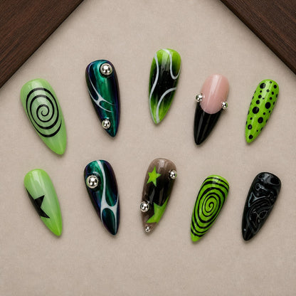 Toxic Swirl Halloween press-on nail set displayed in a walnut tray — almond shape
