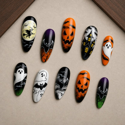 Witching Hour Halloween press-on nail set displayed in a walnut tray — almond shape